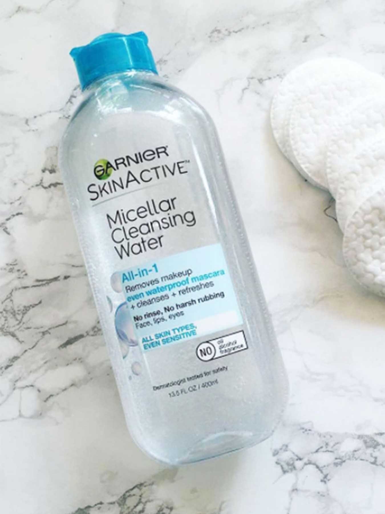 In Use view of Blue Cap Cleansing Water All-in-1, All Skin Types.